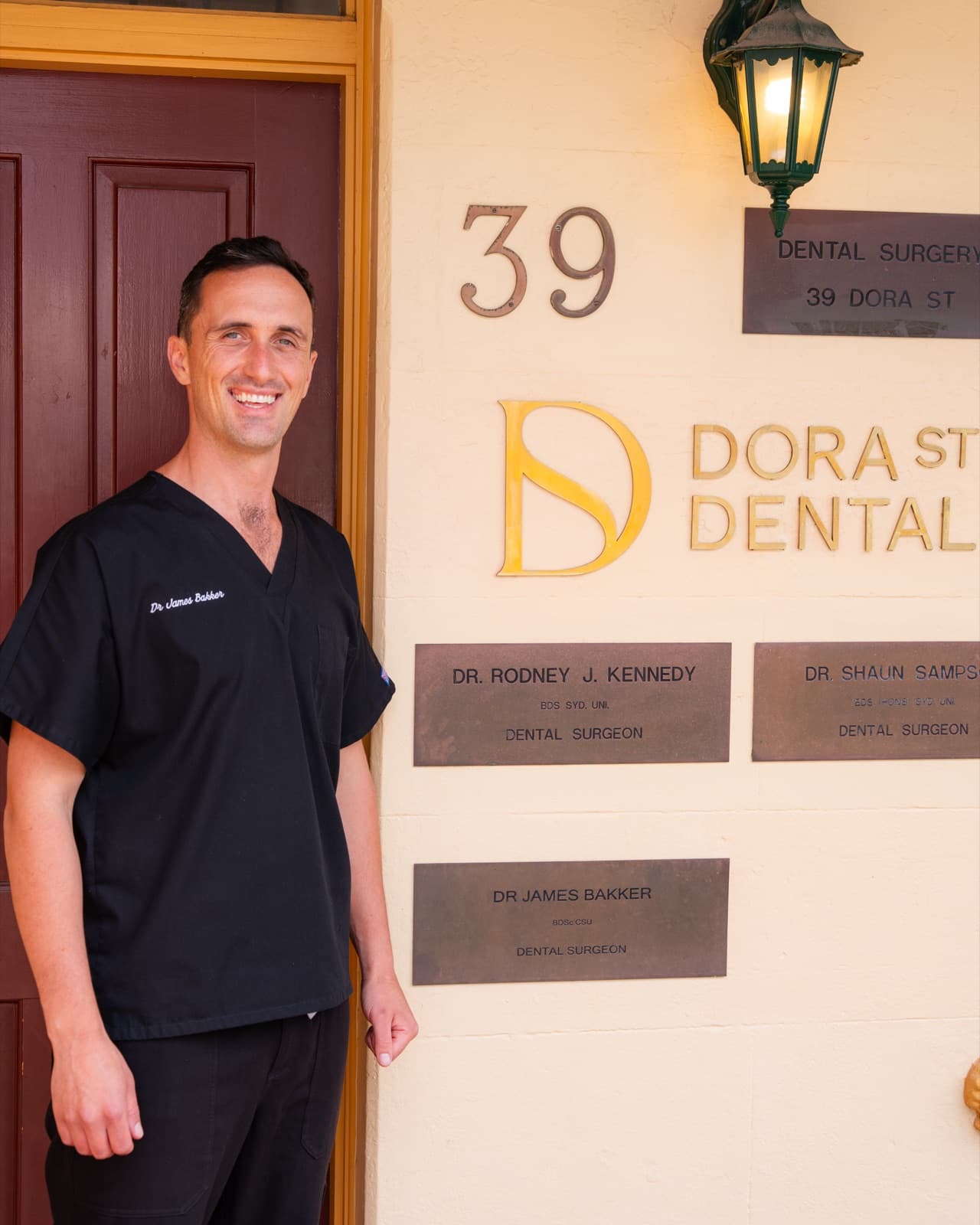Dr James Bakker at the front door of Dora Street Dental